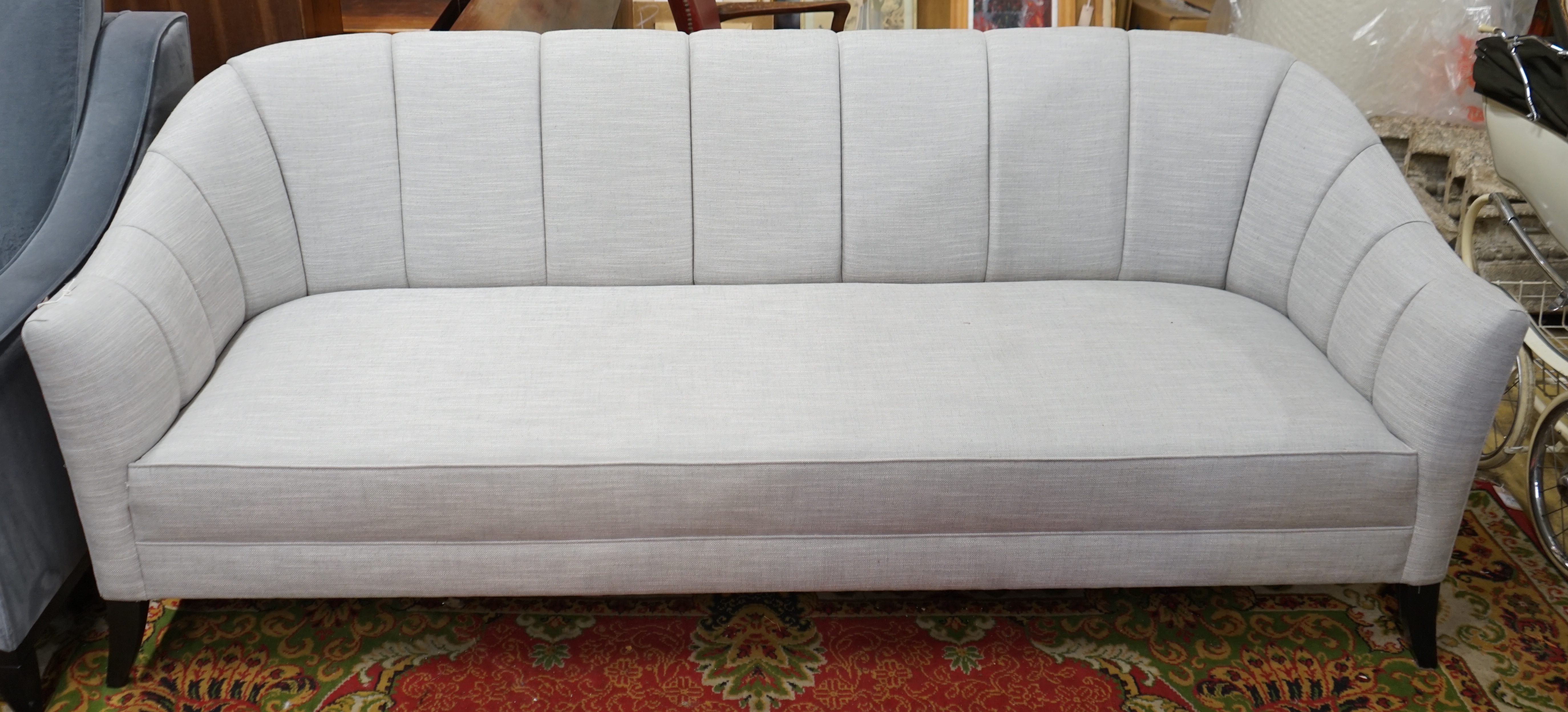 A Bray Design channel back settee in Sahco flint fabric, width 210cm, depth 84cm, height 83cm